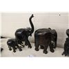 Image 1 : 3 HAND CARVED EBONY ELEPHANT WITH TRUNK EXTENDED, 18" TALL (TO TOP OF TRUNK) IVORY INLAID INTO FEET