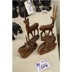 LOT OF 4 HAND CARVED WOODEN GAZELLES- 2 SITTING, 2 STANDING (ONE WITH BROKEN HORN)