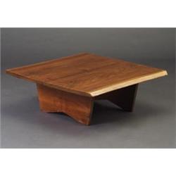 Fine GEORGE NAKASHIMA walnut coffee table, 1962, with two free-edge planks joined by three rosewo...