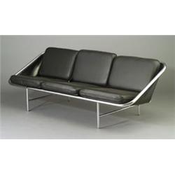 GEORGE NELSON for HERMAN MILLER "Sling" sofa with six loose black leather cushions, on a tubular...