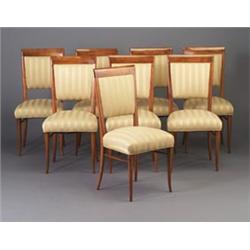 Set of eight Italian walnut dining side chairs, c. 1950, the seats and backs upholstered in yello...