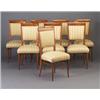 Image 1 : Set of eight Italian walnut dining side chairs, c. 1950, the seats and backs upholstered in yello...