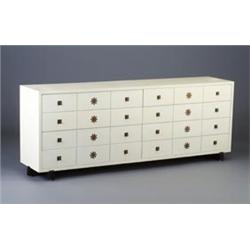 TOMMI PARZINGER ivory enameled eight-drawer chest with twenty-four rectangular divisions to the f...