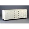 Image 1 : TOMMI PARZINGER ivory enameled eight-drawer chest with twenty-four rectangular divisions to the f...