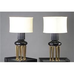 Pair of JAMES MONT custom-designed table lamps, en suite with preceding, each with eight brass ba...