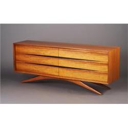 Fine VLADIMIR KAGAN six-drawer cherry dresser with channeled case and sculpted drawer fronts with...