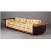 Image 1 : Large VLADIMIR KAGAN walnut veneer sofa with broad shelf arms, reupholstered in floral print fabr...