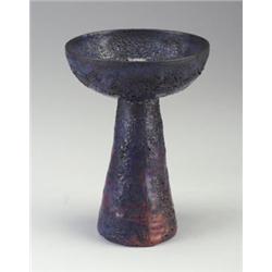 Fine and rare BEATRICE WOOD chalice with conical base, covered in a lustered oxblood, cobalt and...