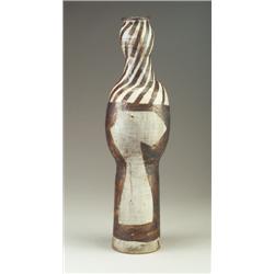 Fine and rare KENNETH PRICE large ceramic sculpture in brown and gray glazes with incised faces....