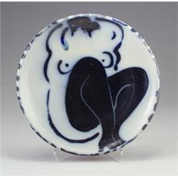 Early, fine and large KEN FERGUSON stoneware charger decorated with a crouched semi-nude woman in...