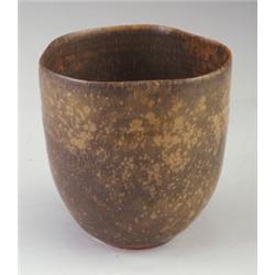 LAURA ANDRESON flaring vessel with irregular rim, covered in a brown, orange and beige crystallin...