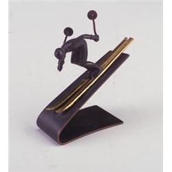 Hagenauer-style bronze figure of skier on slope. Unmarked. 4 1/4" x 3 1/2" x 4 3/4"  $250 - 350...