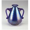 Image 1 : Vase of iridescent purple and blue glass with applied curvilinear handles. Unmarked. 7" x 6 1/2"....