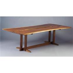 Exceptional GEORGE NAKASHIMA walnut dining table with two free-edge bookmatched planks connected...