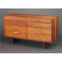Fine and rare GEORGE NAKASHIMA eight-drawer cherry dresser with dovetailed case construction. Che...