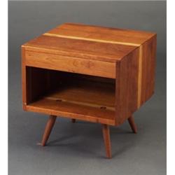 Fine and rare GEORGE NAKASHIMA cherry night stand with lined drawer and open shelf on flaring dow...