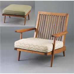 GEORGE NAKASHIMA walnut armchair and ottoman, the chair with spindled back, paddle arms and broca...