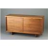 Image 1 : GEORGE NAKASHIMA walnut credenza with dovetailed case construction, free edge, and two sliding pa...