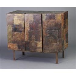 PAUL EVANS cabinet of patinated brass and copper patchwork with single and bi-fold door on angle-...