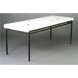 Modern dining table with a white laminate rectangular top inset with six small ceramic tiles on a...