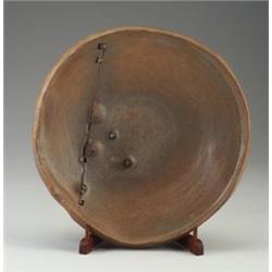 Fine and large PETER VOULKOS stoneware charger, 1987, with protruding clay forms and incised draw...