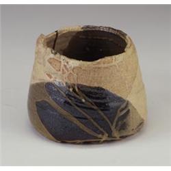 PETER VOULKOS stoneware vessel, 1971, with torn rim and punctured base, gas-fired with glossy umb...