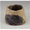 Image 1 : PETER VOULKOS stoneware vessel, 1971, with torn rim and punctured base, gas-fired with glossy umb...