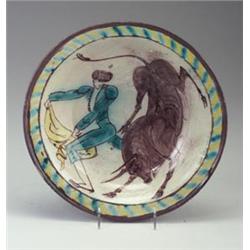 Fine and large HUNT DIEDRICH footed bowl, 1925, painted with a matador and bull in turquoise, umb...