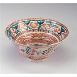 CARL WALTERS tin-glazed flaring bowl, 1925, with salmon and teal animals and leaves on a glossy b...