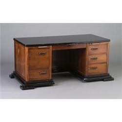 Art Deco double-pedestal mahogany desk with black lacquered top and stepped base, six drawers and...