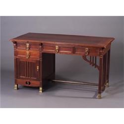 Austrian Secessionist mahogany desk with four panel-front drawers and a cabinet, short corbels un...
