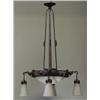 Image 1 : French Art Deco hand-hammered iron chandelier, c. 1926, with frosted glass dome and four pendant...