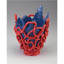 GAETANO PESCE flaring molded rubber vase with organic-edged blue body and applied red extrusion....