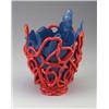 Image 1 : GAETANO PESCE flaring molded rubber vase with organic-edged blue body and applied red extrusion....