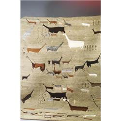 Alpaca and wood room-size rug in with llama motif in shades of brown and gray on a dusty olive gr...