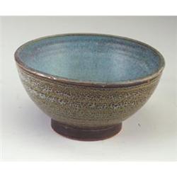MAIJA GROTELL stoneware hemispherical footed bowl, its exterior covered in a mottled gunmetal bro...