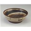 Image 1 : JOHN FOSTER wheel-thrown stoneware bowl with umber underglaze, the exterior with geometric forms,...
