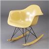 Image 1 : CHARLES EAMES for HERMAN MILLER fiberglass shell armrocker with ochre shell, birch runners, and b...