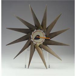 GEORGE NELSON for HOWARD MILLER wall clock (no. 2240) with patinated brass fins and enameled hand...