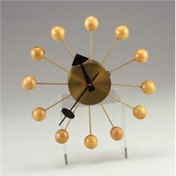 GEORGE NELSON for HOWARD MILLER "Ball Clock," with spun brass center, enameled hands, and spheric...