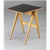 Image 1 : Compass side table in the style of Allan Gould, with raked tapering legs and black laminate top....