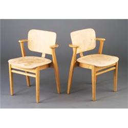 Pair of early KNOLL armchairs with molded plywood seat and back. Stripped finish. Early H.G. KNOL...