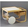 Image 1 : ALVAR AALTO molded birch-plywood teacart with white ceramic tile top, large wooden wheels with ru...