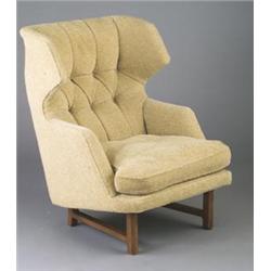 EDWARD WORMLEY for DUNBAR wingchair upholstered in original pale yellow boucle fabric with tufted...