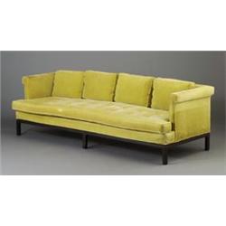 DUNBAR sofa upholstered in pale gold velvet on ebonized base. Ink stain to seat. Unmarked. 26 1/2...