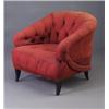 Image 1 : JAMES MONT lounge chair upholstered in its original tufted red fabric, with black lacquered sabre...