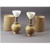 Image 1 : Pair of JAMES MONT spherical footed lamp bases with gold accents and incised horizontal banding....