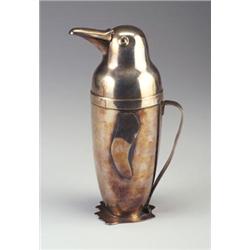 NAPIER chrome penguin cocktail shaker with hinged "beak" pour-spout. Three minor dents to top of...