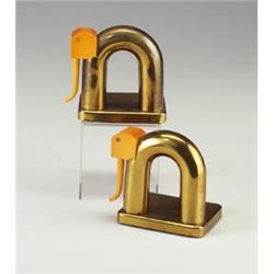 Pair of CHASE Art Deco elephant bookends in brass and orange bakelite. Stamped mark. 4 3/4  x 5 ...
