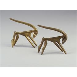 Pair of FREDERICK WEINBERG cast brass stylized antelopes. Original patina. Each stamped copyrig...